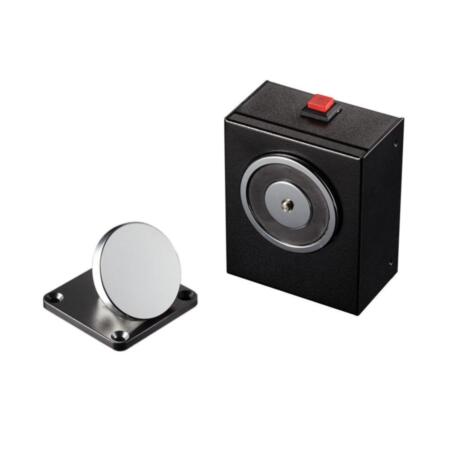 CONAC-686 | Elettromagnete fermo d'installazione in pareti per porte taglia fuoco. Chiusura automatica le porte in caso di allarme d'incendio. Ritengono 50 kg. Pulsante di sblocco di emergenza/test. Funzionamento per applicazioni di tensione. 24V CC.