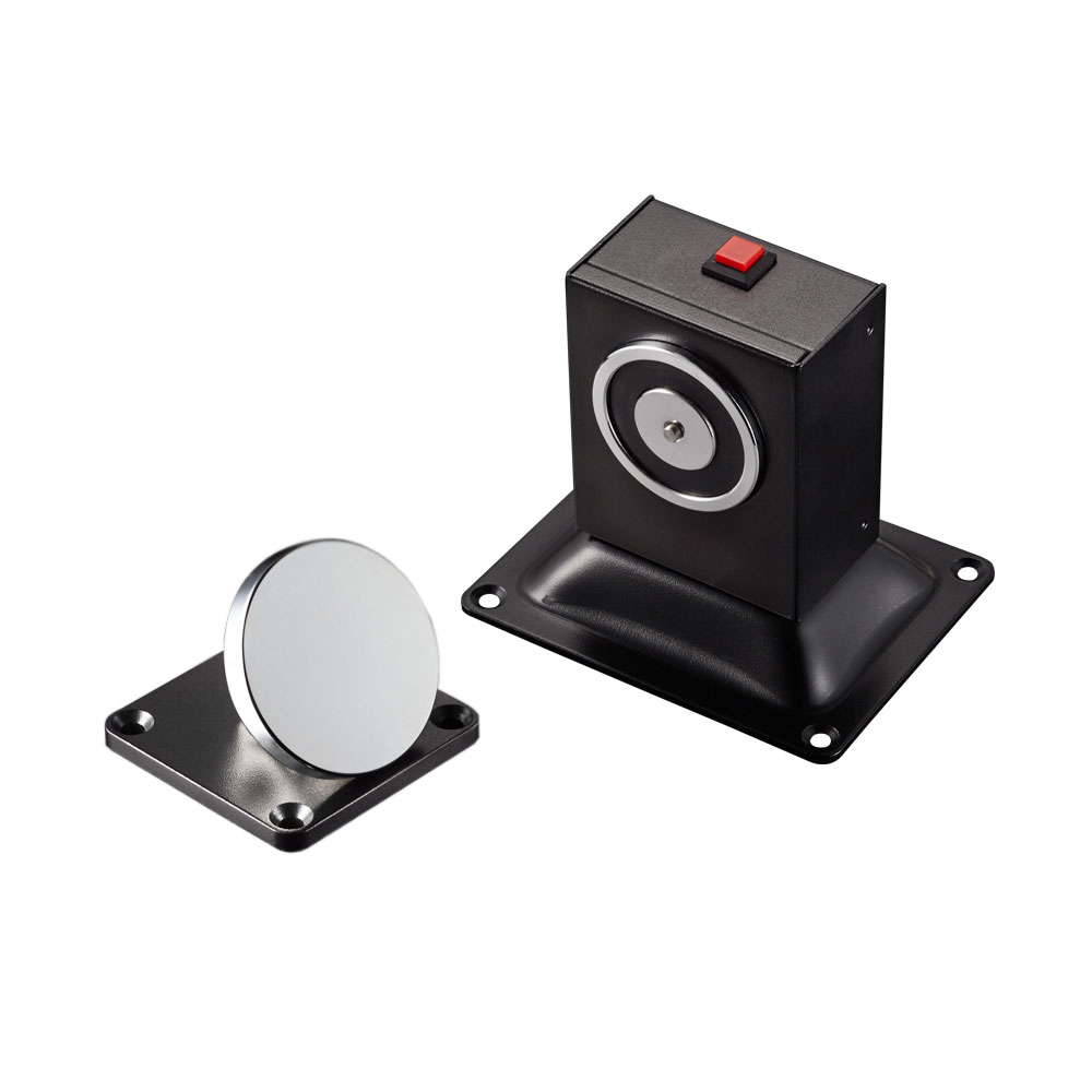 CONAC-687 | Elettromagnete fermo d'installazione in pareti/suolo per porte taglia fuoco.Chiusura automatica delle porte in caso di allarme d'incendio. Ritenzione di 50 kg. Pulsante di sblocco di emergenza/test. Funzionamento per applicazione di tensione. 24V CC.